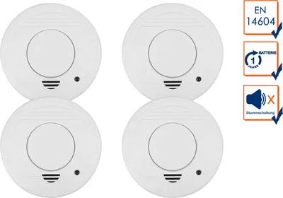 Four white smoke detectors arranged in a 2x2 grid, with informational icons and text on the right side.