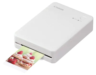 Produktbild von Canon SELPHY QX20 WH, Farbstoffsublimation, 287 x 287 DPI, 2.8" x 3.3" (7.2x8.5cm), Randloser Druck, WLAN, Bluetooth