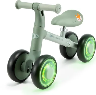 A green balance bike with illuminated wheels.