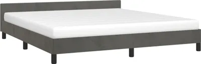 A dark gray bed frame with a white mattress on a white background.