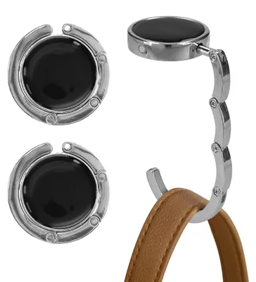 Produktbild von kwmobile Taschenhalter für Tisch - 2x Handtaschenhalter für Tisch - Taschenhaken faltbar - Taschen Aufhänger - Taschen Halter Haken - Tischhaken Set