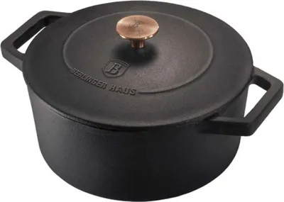 A black cast iron pot with a bronze knob on the lid.