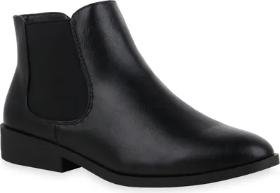 A black Chelsea boot is shown from the side against a white background.