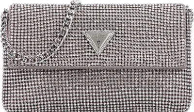 A silver clutch bag with a chain strap and a Guess logo.