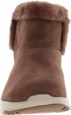 A close-up, front-facing view of a brown boot with faux fur trim.