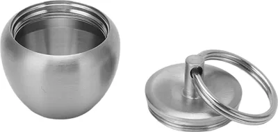 Produktbild von Pillendose aus Edelstahl in Apfelform, tragbar, kleine Medikamentenbox aus Edelstahl, versiegeltes Glas, Schlüsselanhänger