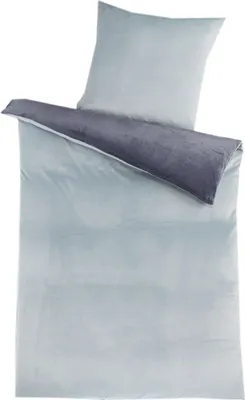 A duvet cover and pillowcase set laid out flat.