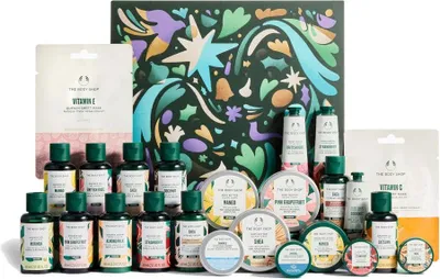 A collection of The Body Shop beauty products arranged on a white background.