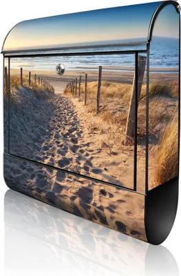 A mailbox with a beach scene printed on it, shown from a diagonal angle.