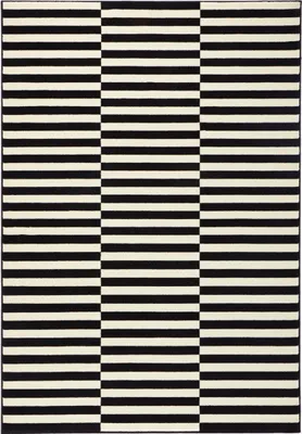 A rug with a black and white striped pattern.