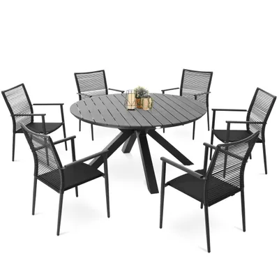 A round outdoor dining table with six chairs, set against a white background.