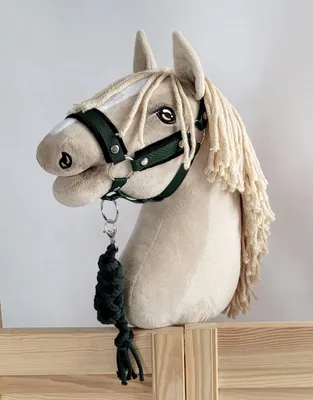 Produktbild von Hobby Horse Babybett A3 mit schwarzem Fell schwarz/grün und handgemachtem Band