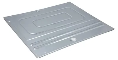 A metal appliance cover with embossed lines and a small white connector.