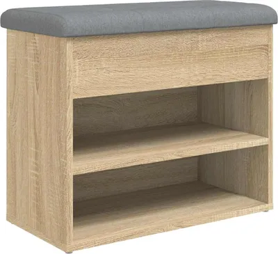 A shoe bench with storage shelves and a padded top.