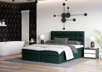 A modern bedroom with a bathtub and a bed.