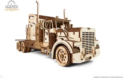 A 3D wooden model of a heavy-duty truck tractor, presented on a white background.