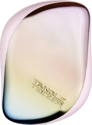 A close-up, studio shot of a Tangle Teezer Compact Styler hairbrush with a pearlescent, matte chrome finish.