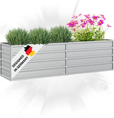 A silver raised garden bed planter filled with green plants and pink flowers, with a diagonal banner indicating it is 'Designed in Germany'.