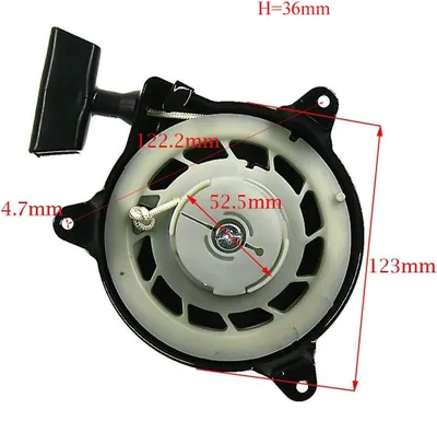 A close-up view of a starter pull cord mechanism for a small engine, with measurement annotations.