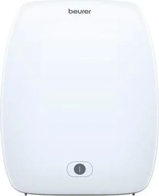A white Beurer brand daylight lamp with a touch control button on the front.