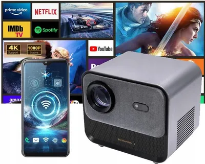 A projector is shown in front of a collage of streaming service logos and movie posters, with a smartphone displaying a Wi-Fi connection icon.