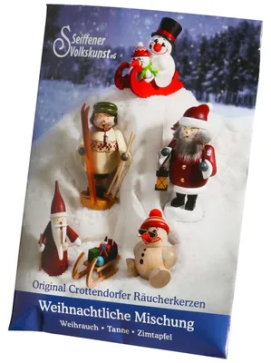 Auf dem Bild ist eine Tüte mit der Aufschrift 'Weihnachtliche Mischung' zu sehen die verschiedene weihnachtliche Figuren wie einen Schneemann und einen Weihnachtsmann auf einem verschneiten Hügel zeigt und für Räucherkerzen wirbt