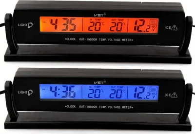Two digital car clocks with thermometer and voltmeter functions are displayed side-by-side.