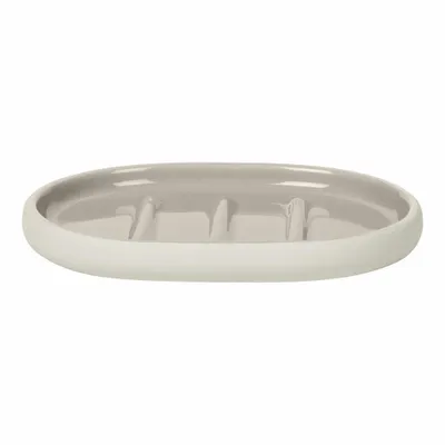 A ceramic soap dish with a gray interior and white exterior, shown from a slightly elevated side angle against a white background.