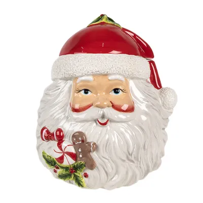 A ceramic cookie jar shaped like Santa Claus's head, holding Christmas treats.