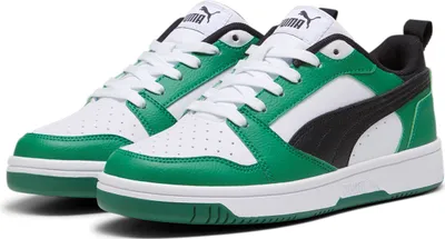 A pair of Puma Rebound V6 Lo. Jr. sneakers in white, green, and black.