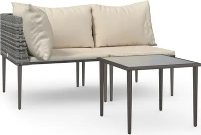 A three-piece outdoor lounge set with cushions and a coffee table, presented on a white background.