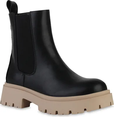 A black Chelsea boot with a thick beige platform sole is shown against a white background.