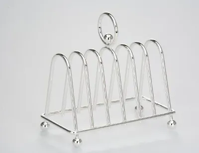 A silver-colored toast rack is displayed against a plain white background.