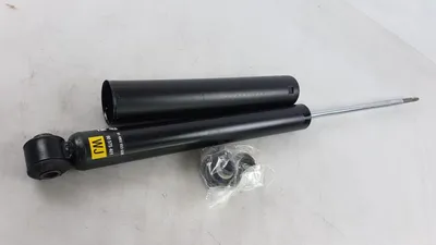 Produktbild von Original OPEL Omega-B Stoßdämpfer mit Befestigungsteilen hinten 90542942