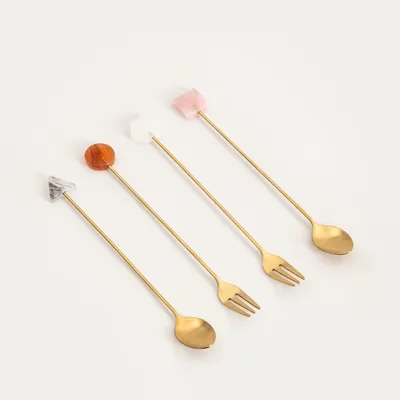 Produktbild von HOMLA DORELLE goldfarbenes Dessertbesteck mit dekorativen Elementen 4-teilig