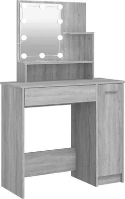 A vanity table with a mirror and lights.