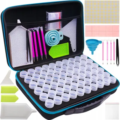 A diamond embroidery storage case with various accessories laid out.