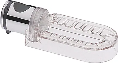 A chrome and clear plastic soap dish for a shower set.