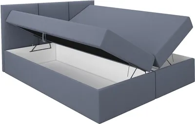 A gray boxspring bed with its storage compartment open, showing the interior.