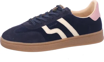 A single blue sneaker with cream and pink accents, shown from the side against a white background.