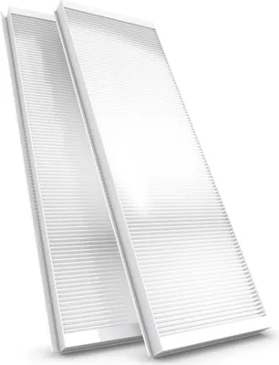 Two white air filters are shown from a diagonal angle against a white background.