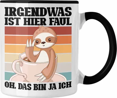 Produktbild von Trendation - Lustige Tasse Irgendwas Ist Hier Faul Geschenk Spruch Faultier Kollegein Kollege Geschenkidee Freundin Freund (Schwarz)