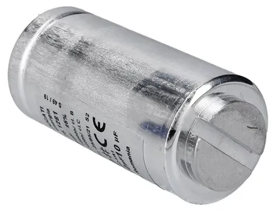 A silver cylindrical capacitor with text printed on its side, set against a white background.