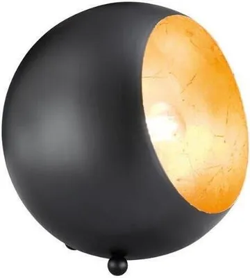 A black table lamp with a gold interior, illuminated by a light bulb.