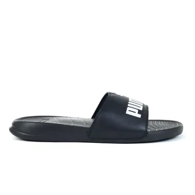 A single black Puma slide sandal is shown against a white background.