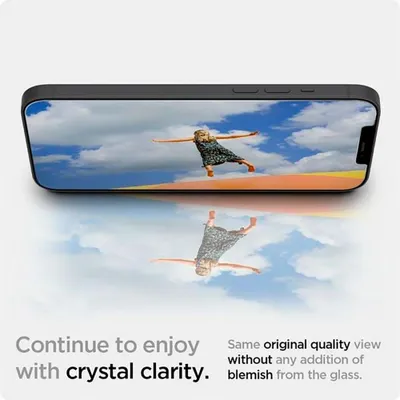 A smartphone displaying an image of a child jumping in the air, with a reflection of the image below.