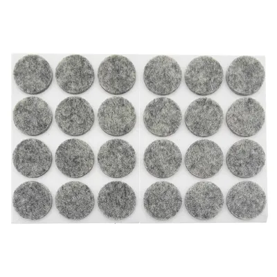 A sheet of round, gray felt furniture pads.