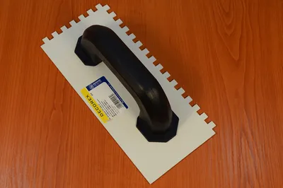 Produktbild von Zahnkelle Glattkelle Reibebrett Maurerkelle Zähne Kelle 12x26cm