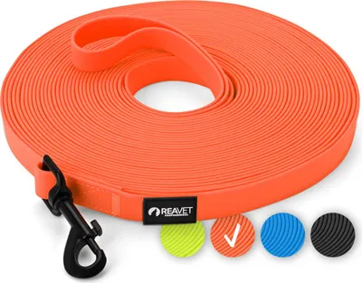 Produktbild von REAVET Schleppleine für Hunde 15 Meter, Neon Orange I Robuste & wasserfeste Hundeleine lang I Übungsleine mit Gepolsterten Griff, Trainingsleine Laufleine für große & kleine Hunde