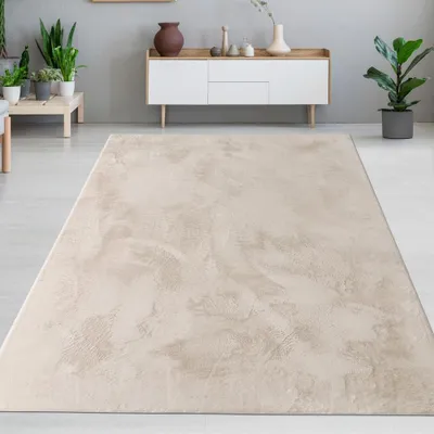 Immagine prodotto di Tappeto in pelliccia di coniglio color crema dall'aspetto elegante e morbido, con un fine luccichio, dimensioni moderne - 120 x 170 cm